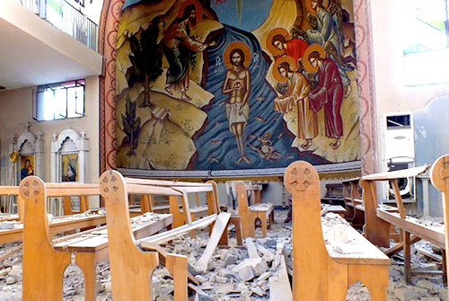 Un preot ajută la evacuarea creştinilor asediați într-un oraș sirian