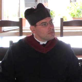 Primul preot catolic fără auz din Canada