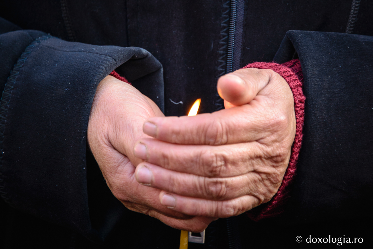 Preotul alături de un muribund