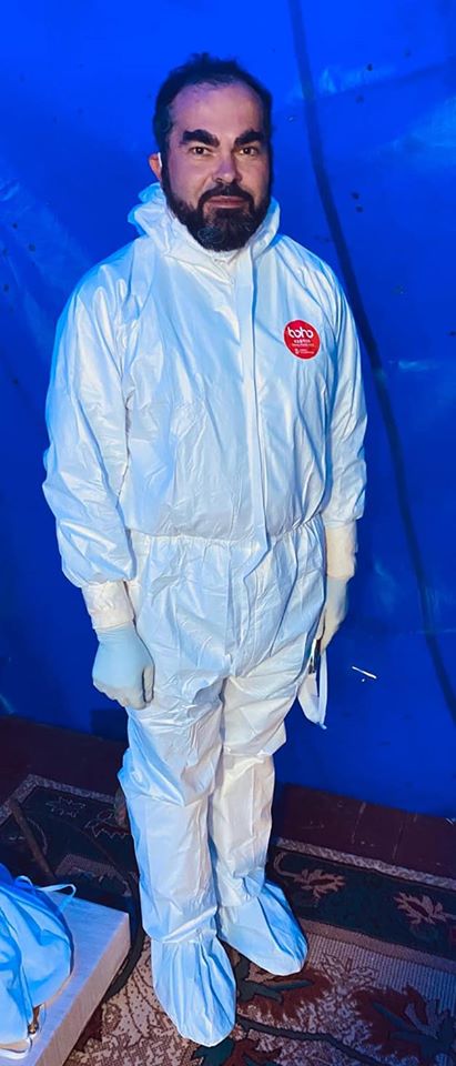 Jertfă pentru ierarhul lor: cine sunt bărbații îmbrăcați în combinezoane care l-au purtat pe IPS Părinte Pimen?