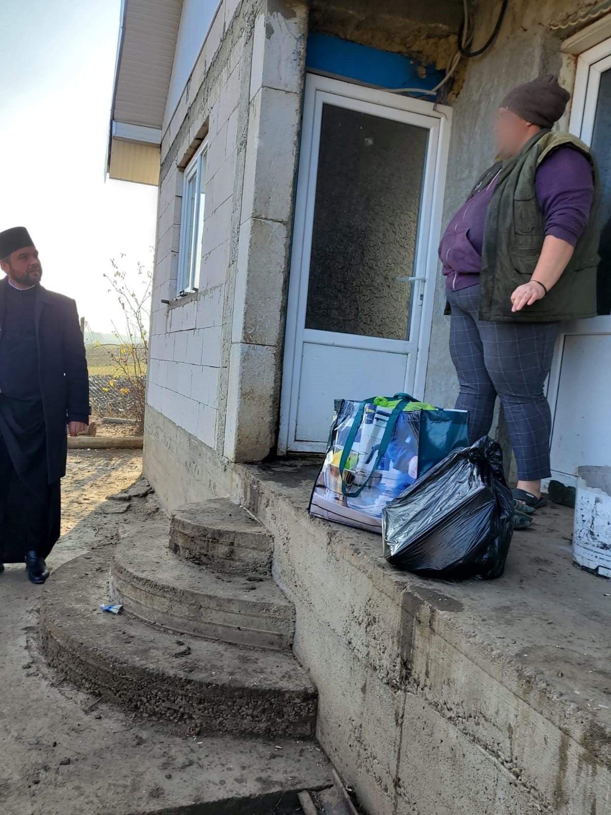 Doi fotografi din Iași au oferit o #masăcaldădecrăciun celor fără posibilități