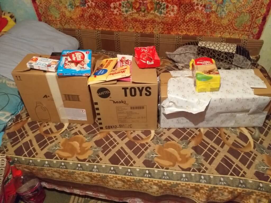 Darurile de Crăciun din Episcopia Europei de Nord au ajuns la 700 de bătrâni și copii nevoiași din România