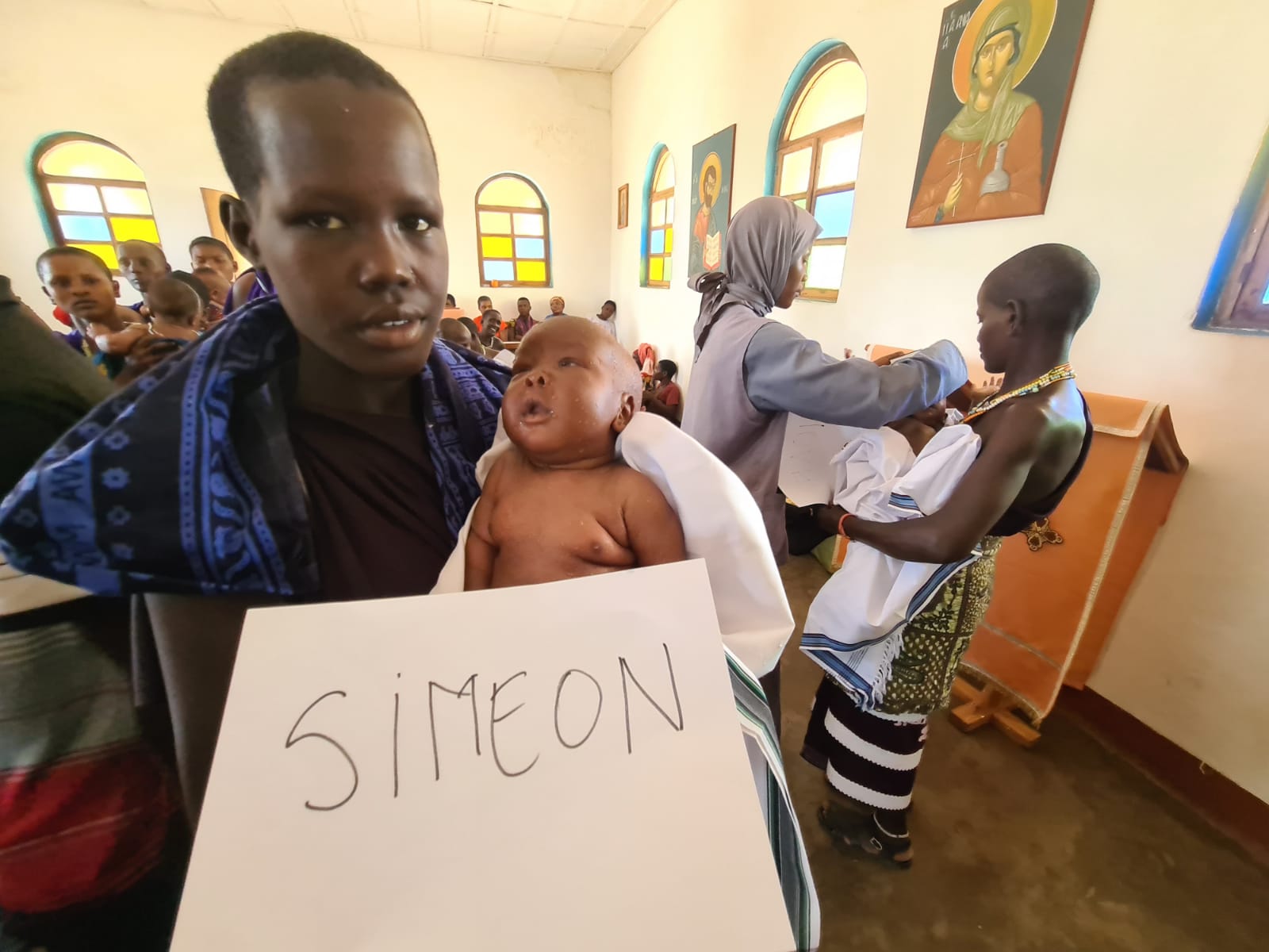 Din apă și din Duh - botez pentru 12 copii de massai