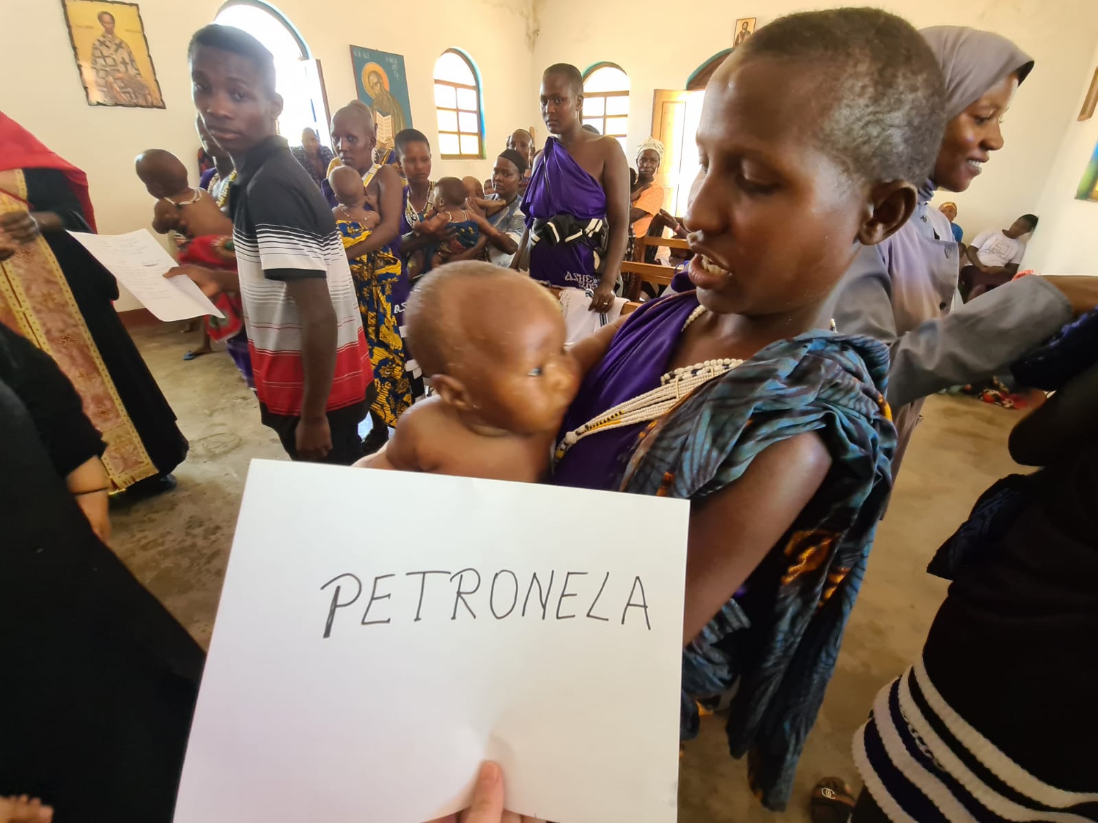 Din apă și din Duh - botez pentru 12 copii de massai