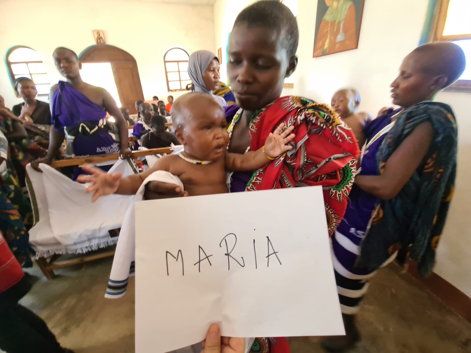 Din apă și din Duh - botez pentru 12 copii de massai