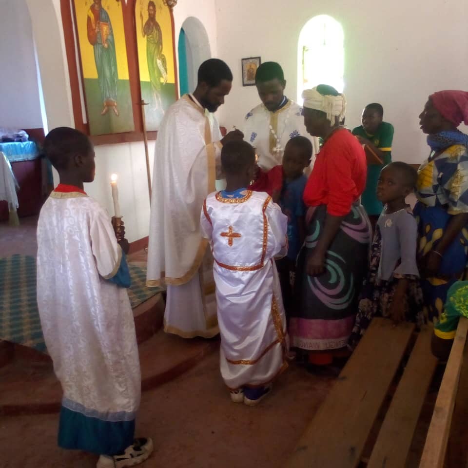 Credinciosi impartasinsu-se