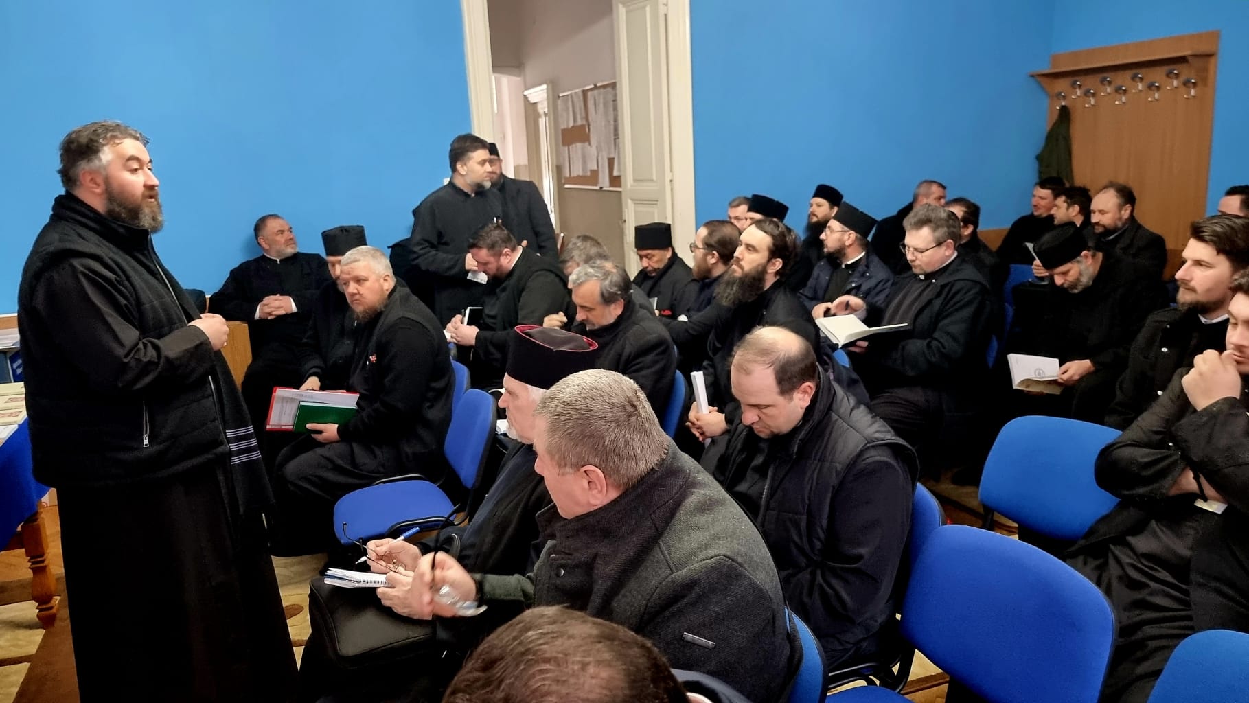 preoți în ședință