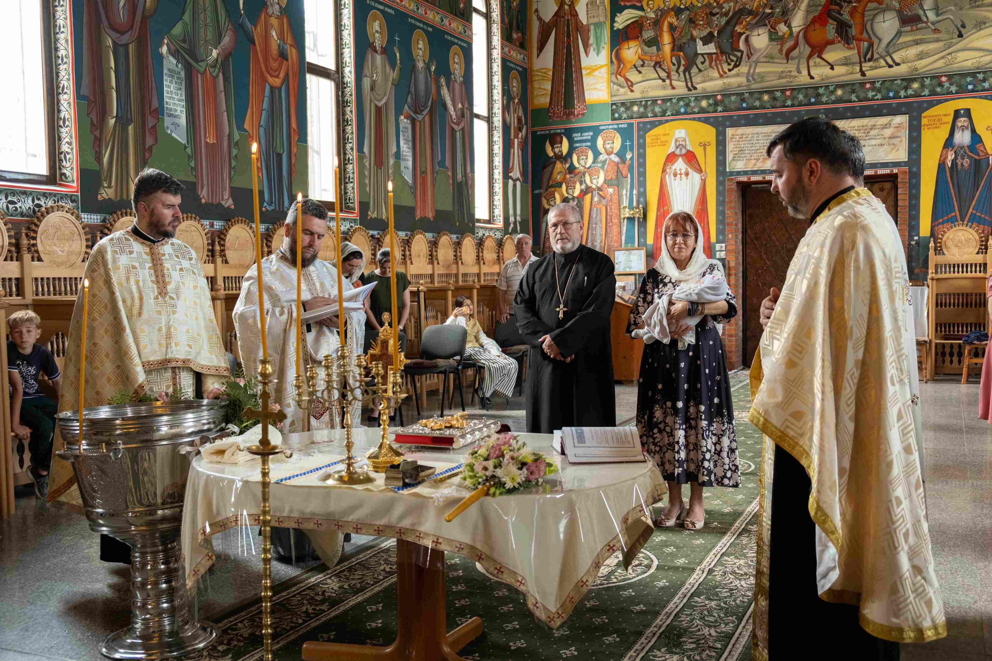 Zi de sărbătoare în familia Rica: a fost botezat al 10-lea copil