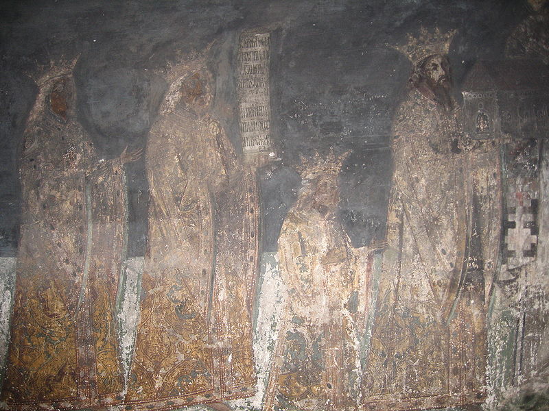 Tabloul votiv de la Biserica „Sfântul Nicolae” (Mănăstirea Bogdana, Rădăuți)
	 Tabloul votiv este pictat în naos, pe peretele de sud-vest al navei. Voievodul care ține în mână biserica fără pridvor nu poate fi Alexandru Lăpușneanu, deoarece el a adăugat pridvorul. Unele opinii acreditează ideea că ar fi Bogdan I. Urmează un copil, apoi un domnitor cu barba scurtă și cu un filacter în mâna stângă care ar putea fi Alexandru cel Bun, apoi un domnitor fără barbă care ar putea fi Ștefan cel Mare, dovadă că pictura a fost făcută în timpul său. Tabloul votiv de la Biserica „Sfântul Nicolae”