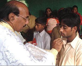 Ajutor frăţesc pentru singurul preot ortodox din Pakistan