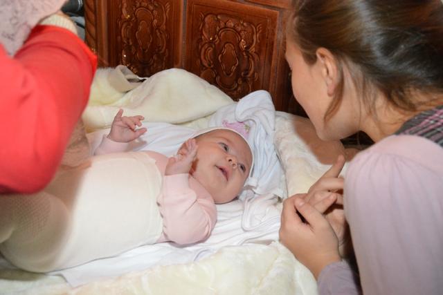 Sfânta Liturghie şi slujba Botezului oficiate de IPS Mitropolit Teofan în Protopopiatul Săveni