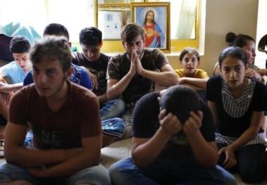 Creștinii irakieni au fugit din calea persecutării ISIS ca să ajungă în spatele gratiilor din SUA