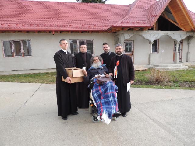 Arhiepiscopia Sibiului a oferit ajutor material unei persoane cu dizabilităţi din Victoria