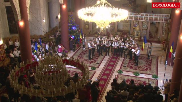 (Video) Corul Trysaghion - „În vârfu' a nouă meri” (de Ghe. Cucu)