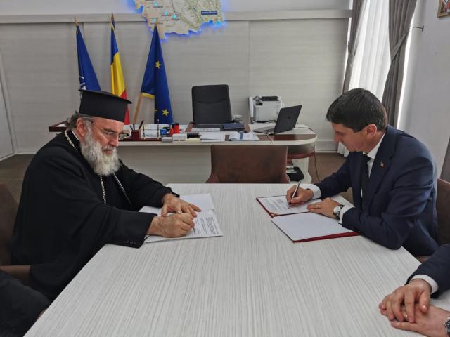 Protocol de colaborare între Arhiepiscopia Romanului şi Bacăului şi Prefectura Bacău
