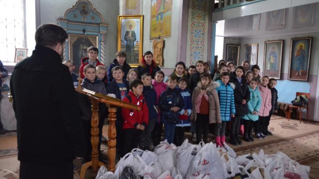 Caravana „Dar de Crăciun” a Episcopiei Hușilor a ajuns și în Basarabia