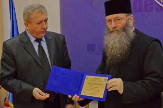 Diplomă de excelenţă pentru arhimandritul Iustin Dragomir