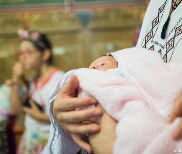 (Foto) Botezul, taina curățirii